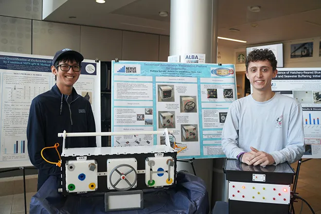 Matthew Satriale and Andrew Vo with their research poster