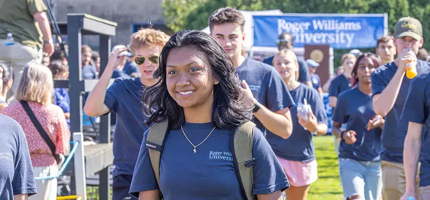A smiling student at Convocation