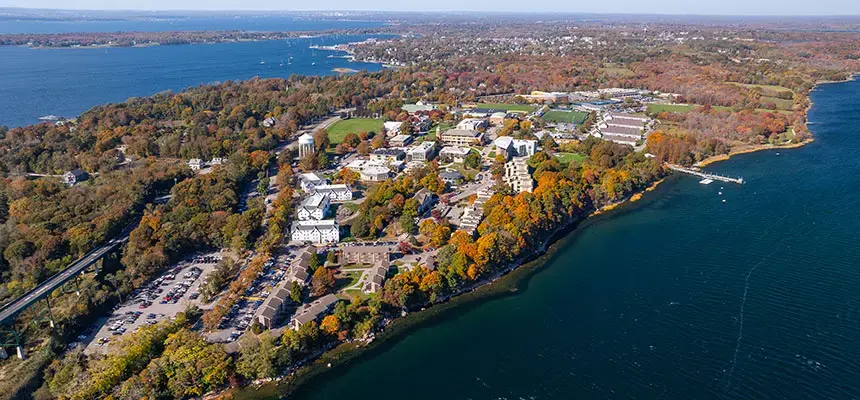 Aerial view of RWU's Bristol campus and the bay that surrounds it