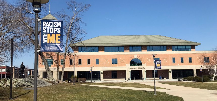 Image of RWU Bristol Campus with Racism Stops With Me pole banner