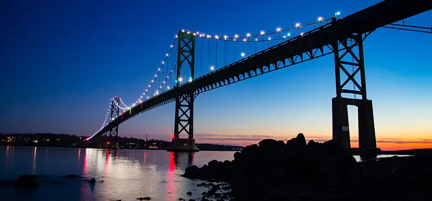 Mount hope bridge at night with lights across it