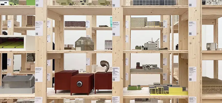 Architecture models housed on wooden shelves