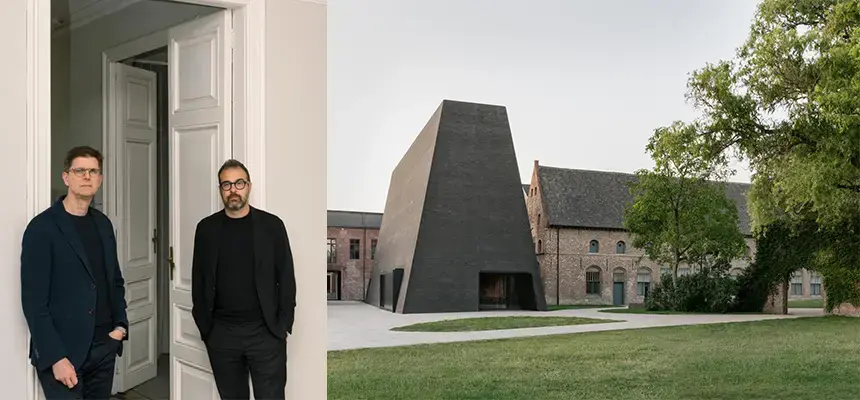 Barozzi and Veiga with a photo of their architecture work