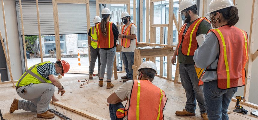 Construction students build model home