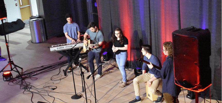 Student band performing in global heritage hall