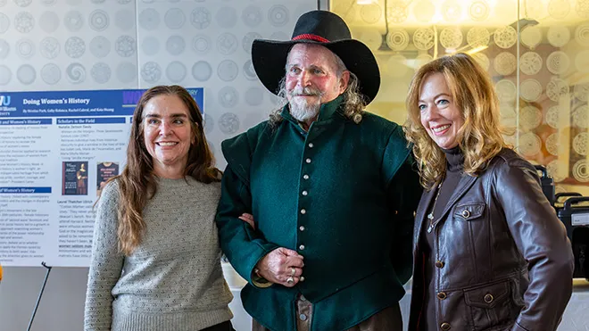 "Roger" poses with guests