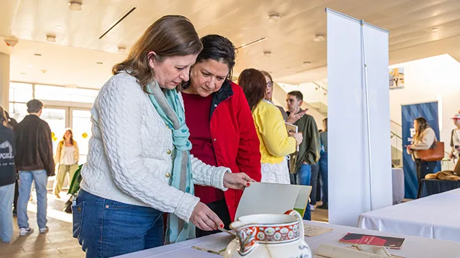 Guests look at artifacts