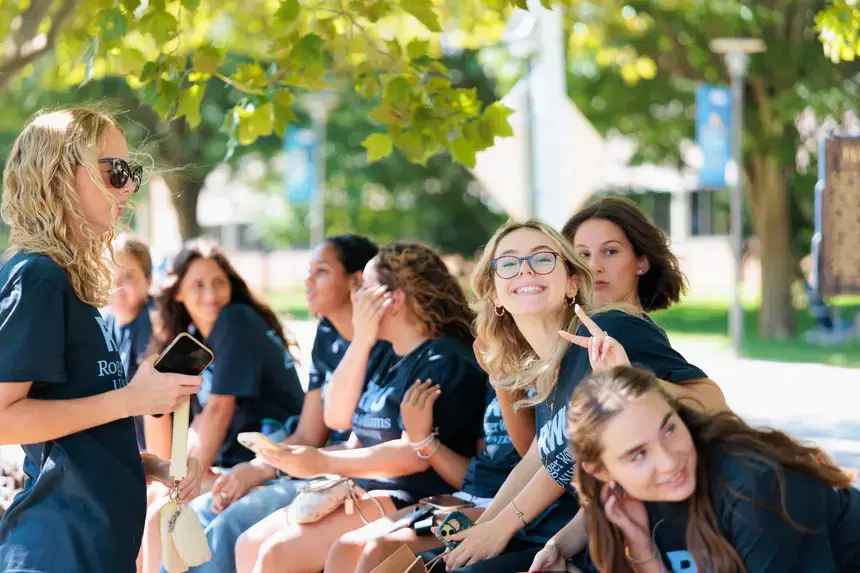 Members of the Class of 2030 talk on the Commons Quad ahead of the Convocation ceremony.