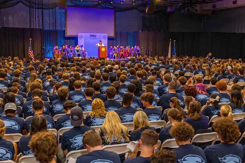 New undergraduate students listen to remarks from President Ioannis Miaoulis.