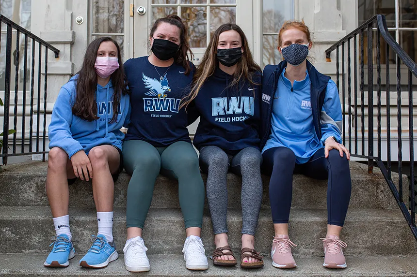 image of RWU Field Hockey Community Outreach group portrait at Women’s Resource Center in Warren, RI