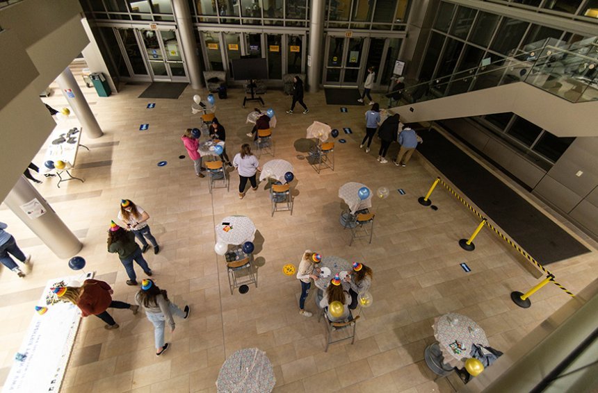 image of part of the party from above showing social distancing practiced at the party