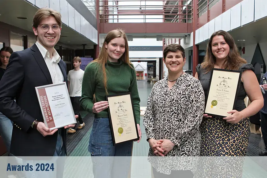 Students pose with their awards