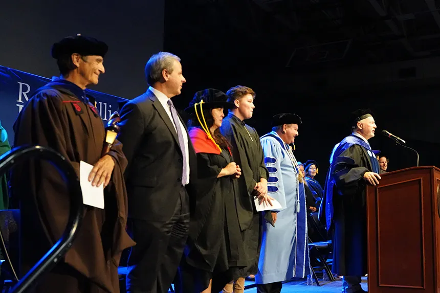 John King at a podium delivering his speech 