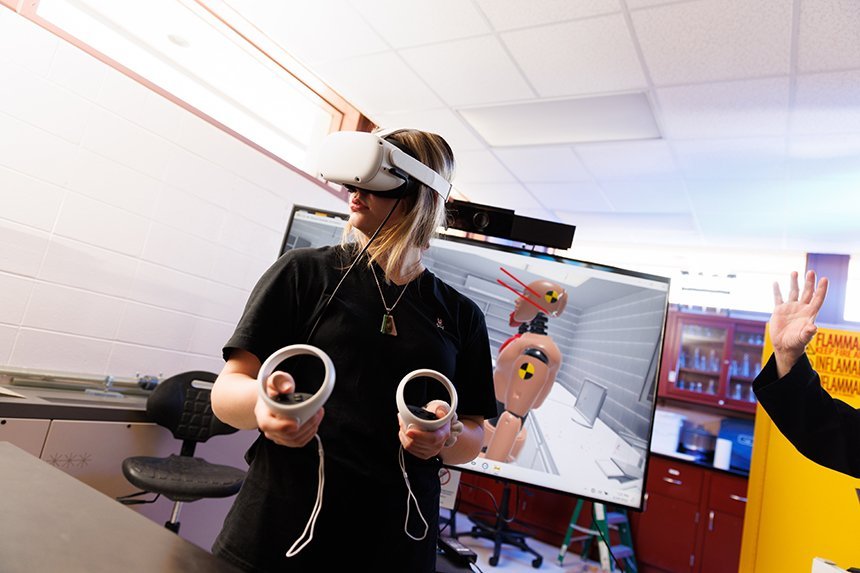 A student wearing a VR headset. 