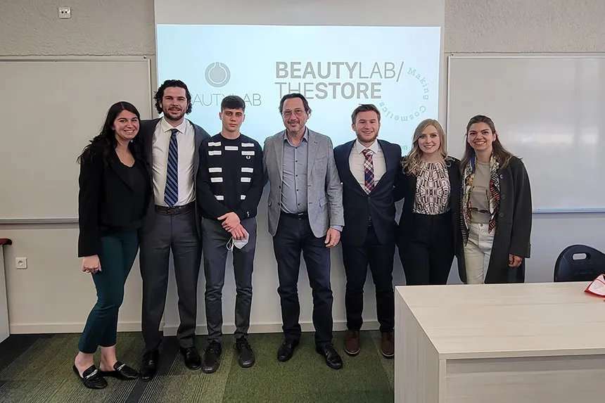 MBA students pose with Beauty Lab CEO