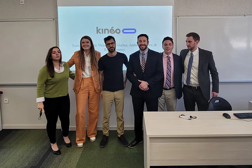 MBA students pose with Kineo CEO