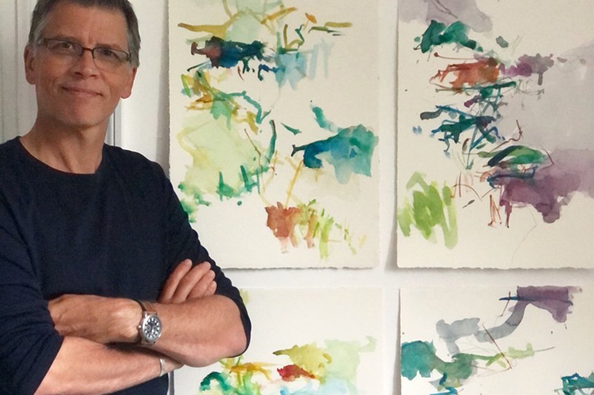 Michael Rich with his paintings at the Chateau Orquevaux in France. 