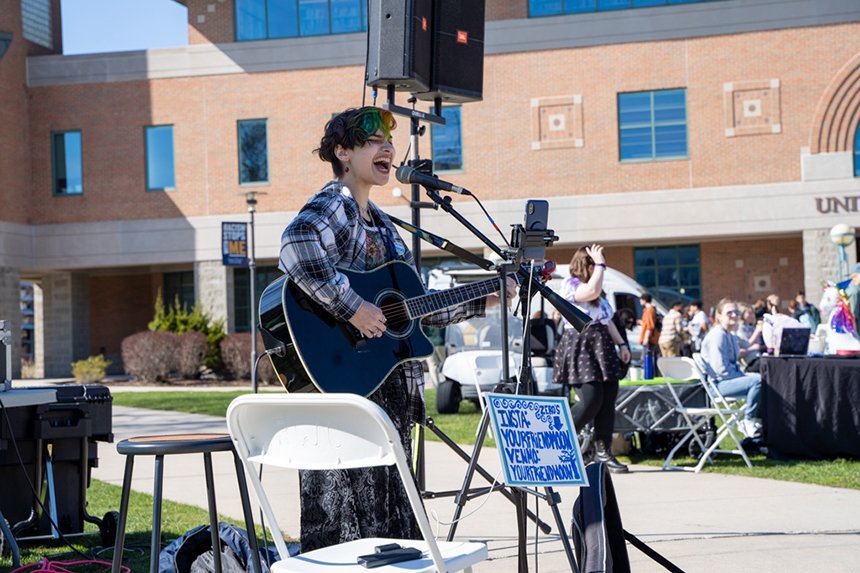 Moon, a Rhode Island-based nonbinary musician, performs during Queer Fest. 
