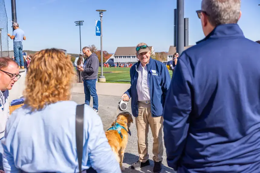 President Yannis speaks to Homecoming and Family Weekend attendees.