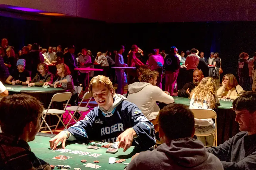Students and families play games at Casino Night.