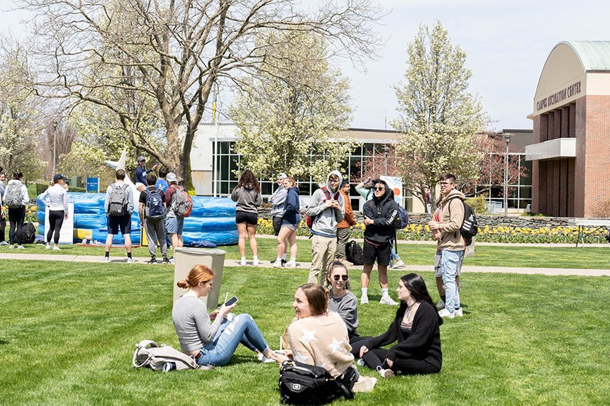 Students gathered on the Commons Quad during a Spring Week event. 