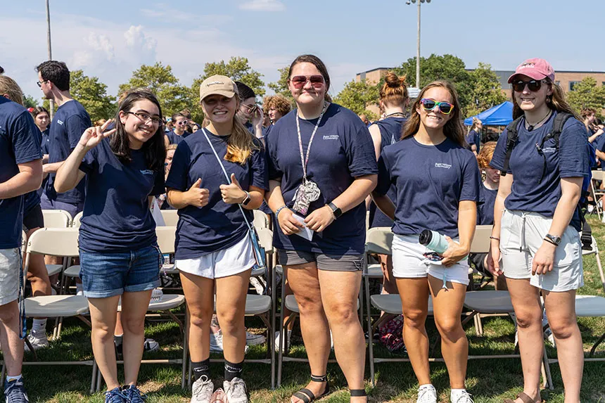 A group of students poses for a photo before Convocation.