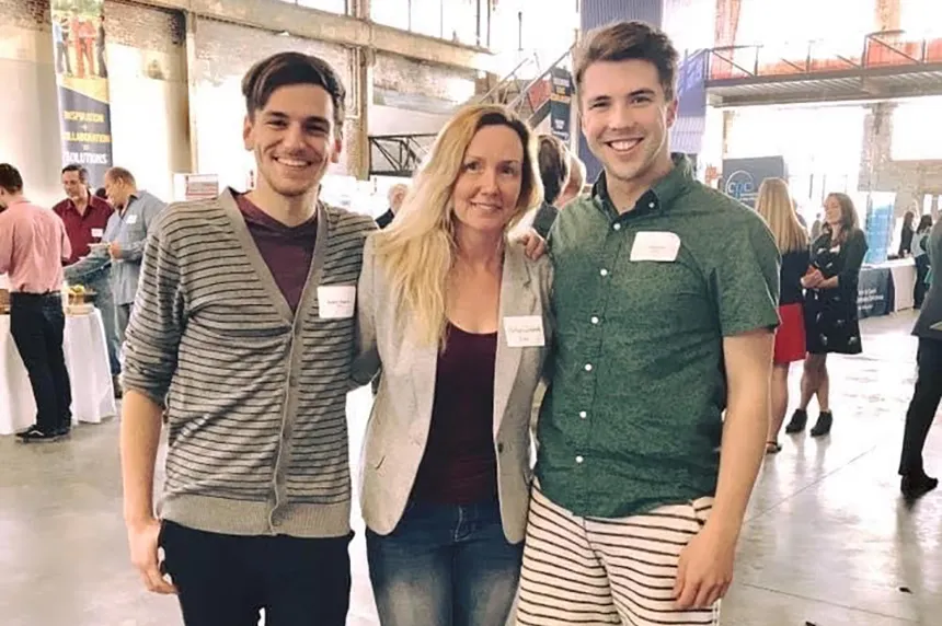 Autumn Quezada-Grant stands with students