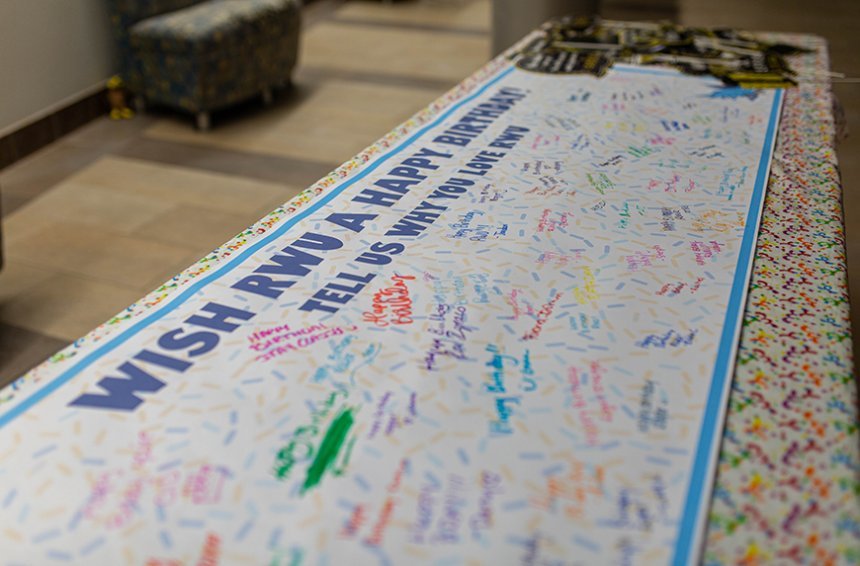 image of the signed banner wishing Roger Williams University Happy Birthday