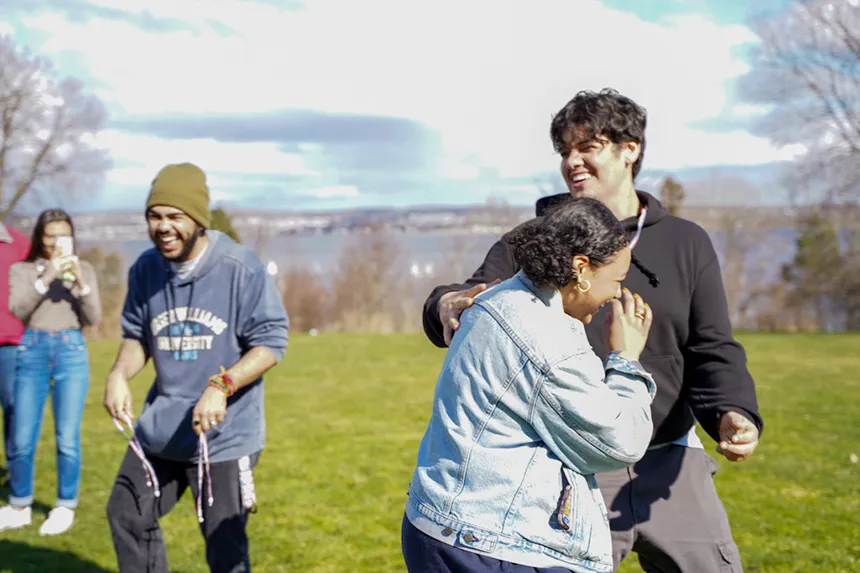 Students gathered on the lawn behind GHH for MSU's Field Day event. 