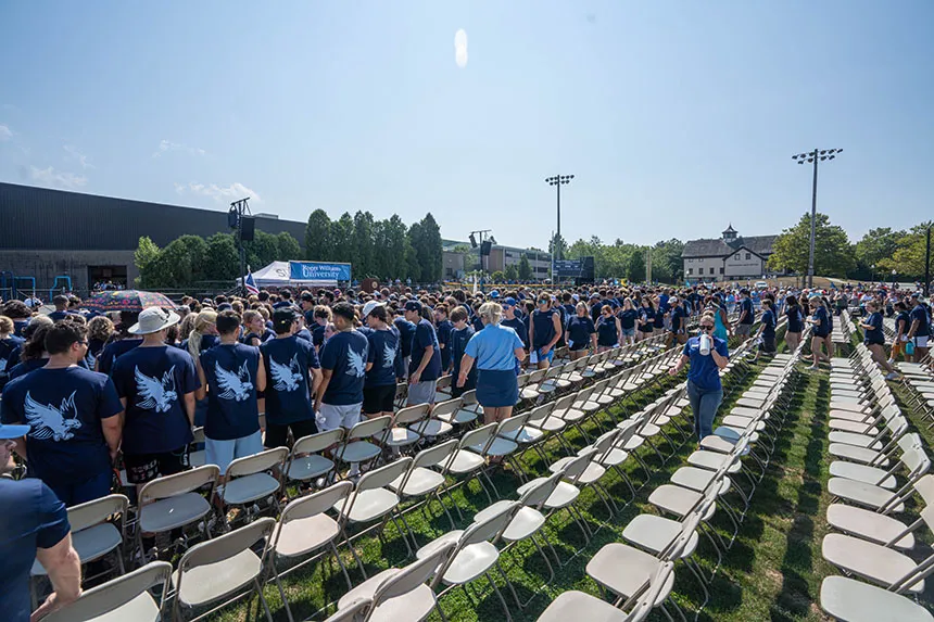 Students file into their seats for the Convocation ceremony.
