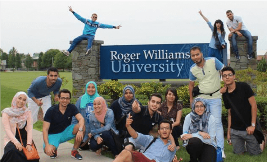 Middle East Partnership Initiative students engage with the RWU campus sign