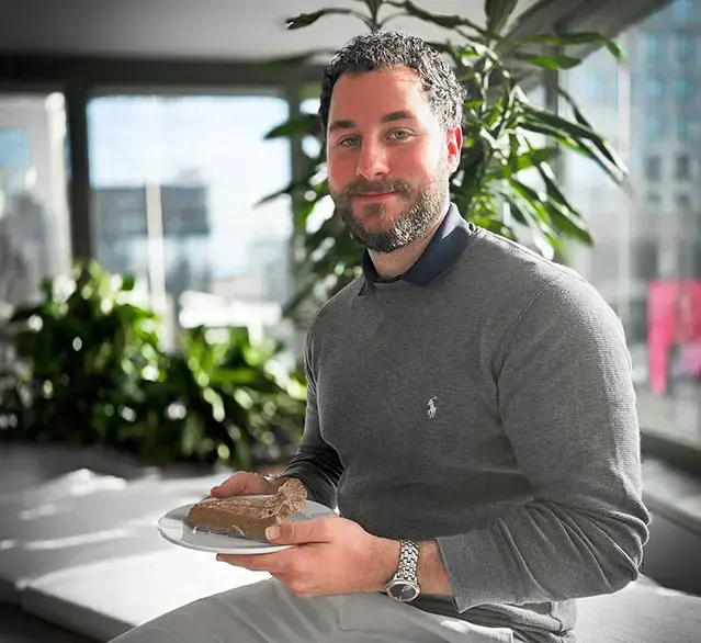 Samuel Wine holds pumpkin pie