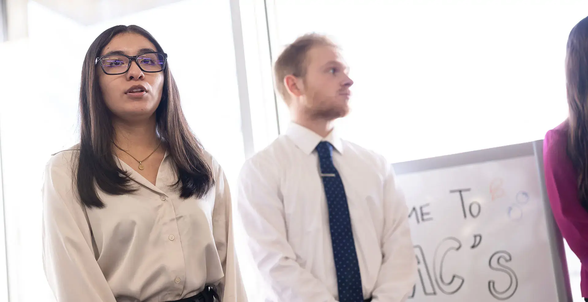 Two business students at an internship
