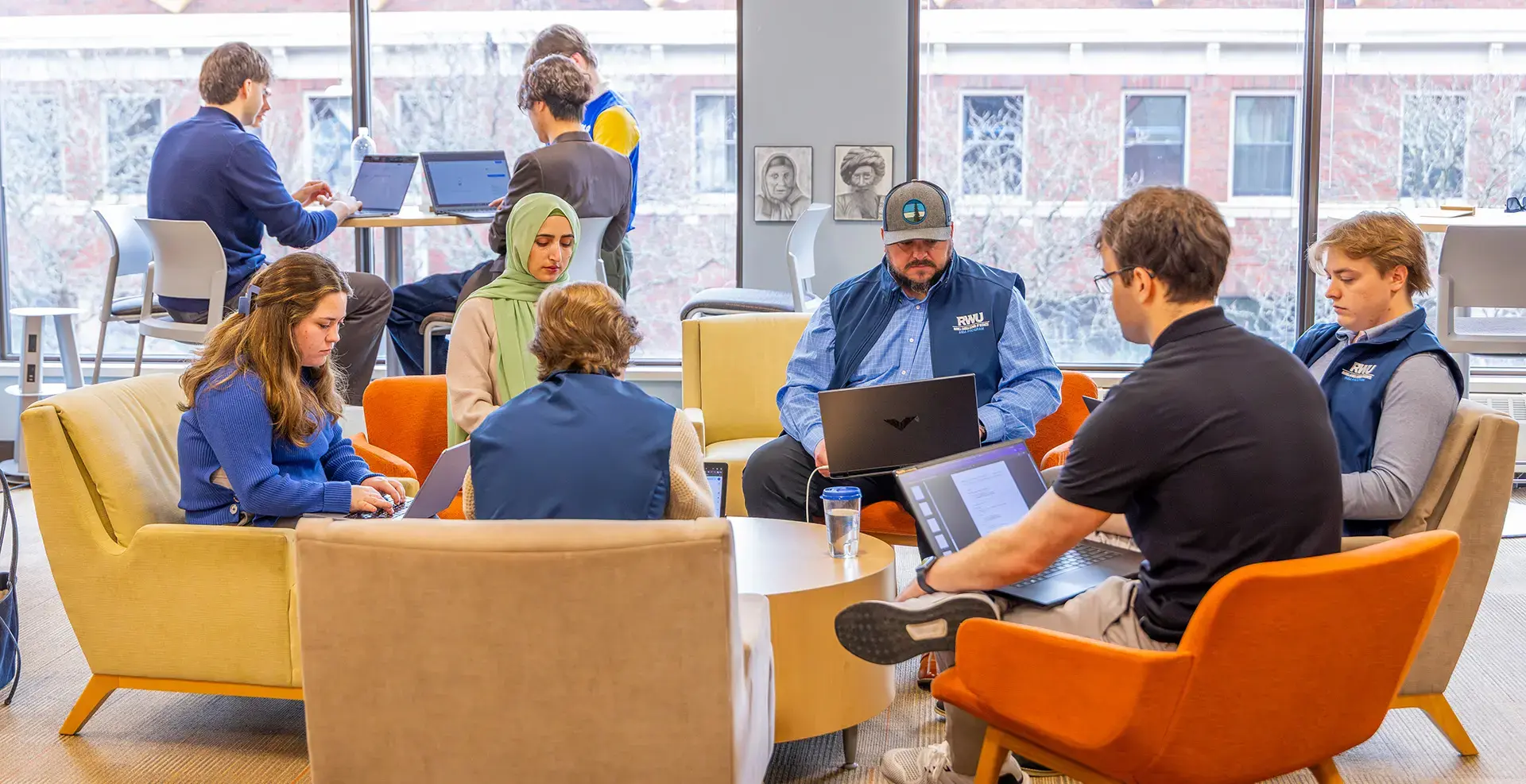 MBA students work on computers