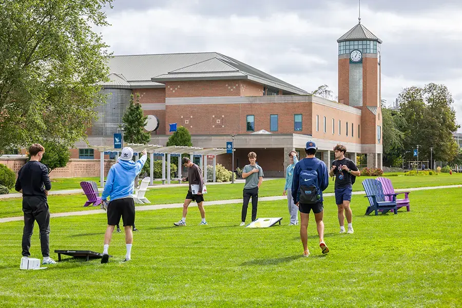 Students play yard games on campus