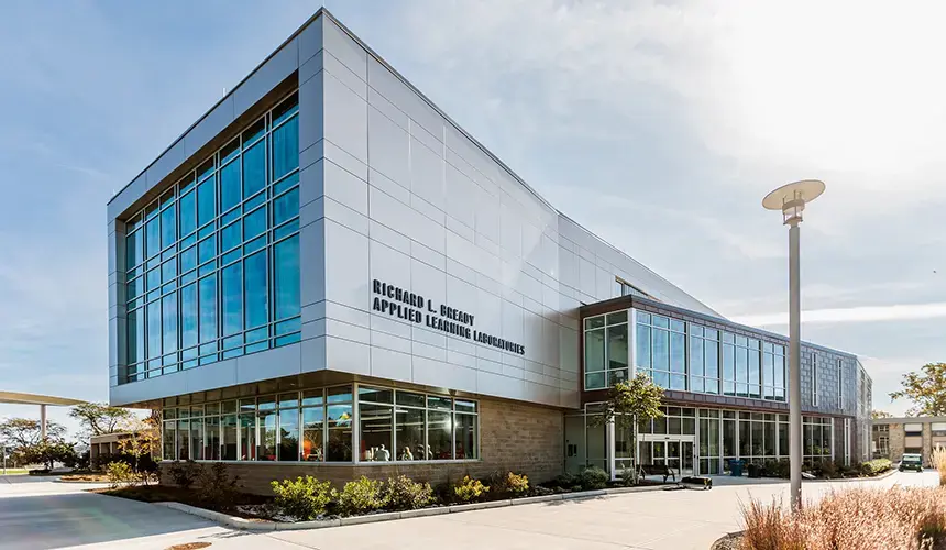 aerial image of the Richard L. Bready Applied Learning Laboratories building with Mount Hope bridge in background