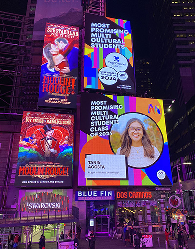 A billboard in Times Square featuring a photo of Tania Acosta