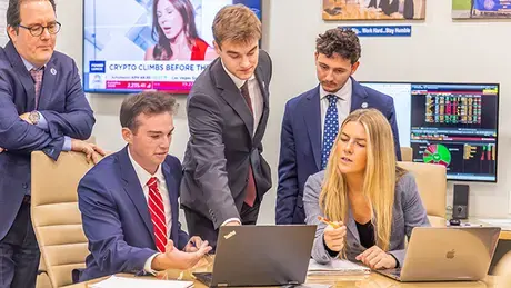 Students working in the CAFE, a prestigious learning experience in the GSB.